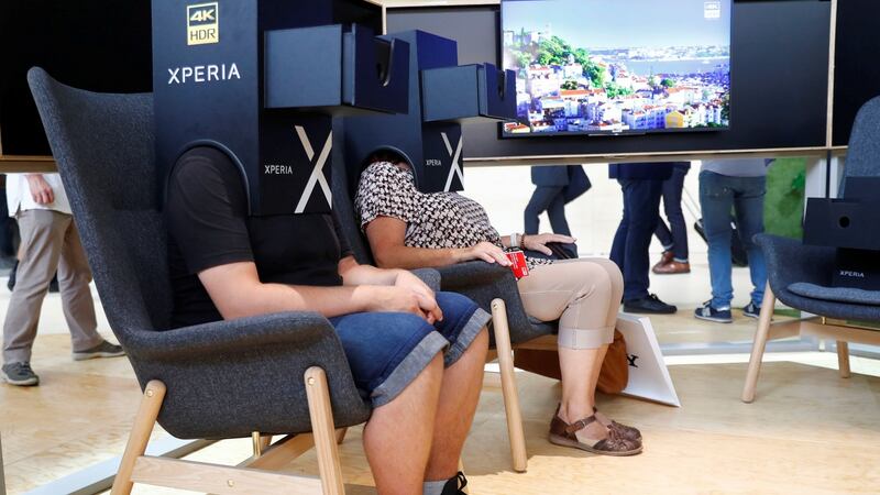 Visitors watch a Sony Xperia 4K HDR presentation at the IFA tech fair in Berlin. Photograph: Fabrizio Bensch/Reuters