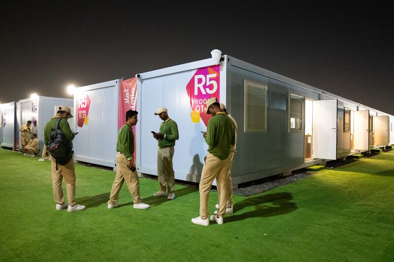 Fan Village is a sea of shipping containers converted to sleeping quarters, stretching almost as far as the eye can see. Photograph: Erin Schaff/The New York Times