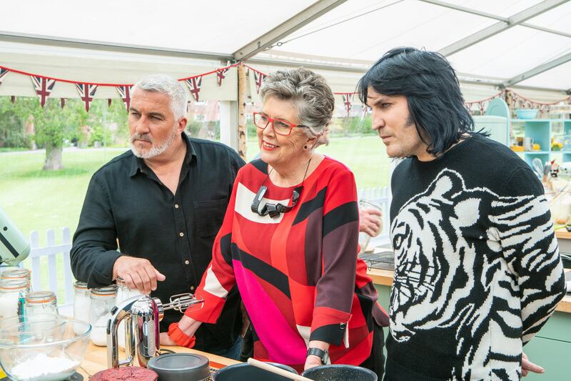 Judge Paul Hollywood alongside  presenters Sandi Toksvig and Noel Fielding.