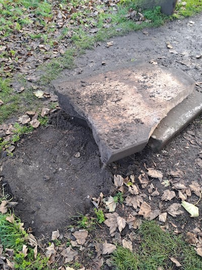 The damaged Scrooge gravestone. Photograph: West Mercia Police/PA Wire 
