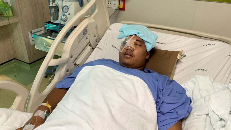 Sirawith Seritiwat, a Thai pro-democracy activist, in hospital in Bangkok after he was attacked. Photograph:  Reuters