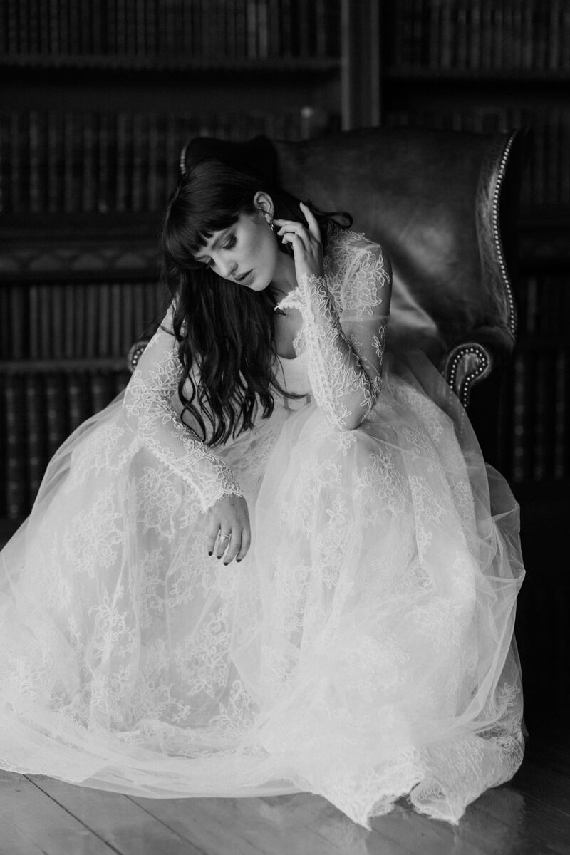 This fairytale dress (€4,410) is by Niamh Lynch of bespokebridal.ie, a newcomer to the wedding scene. It is made with French corded lace and features  pearl button detailing with detachable sleeves. Photograph: Paula O’Hara