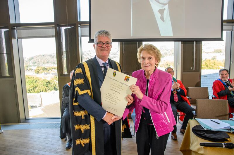 Prof John O'Halloran, UCC president, with Kathleen Anglin, wife of Michael Cowhig. Photograph: Daragh Mc Sweeney/Provision