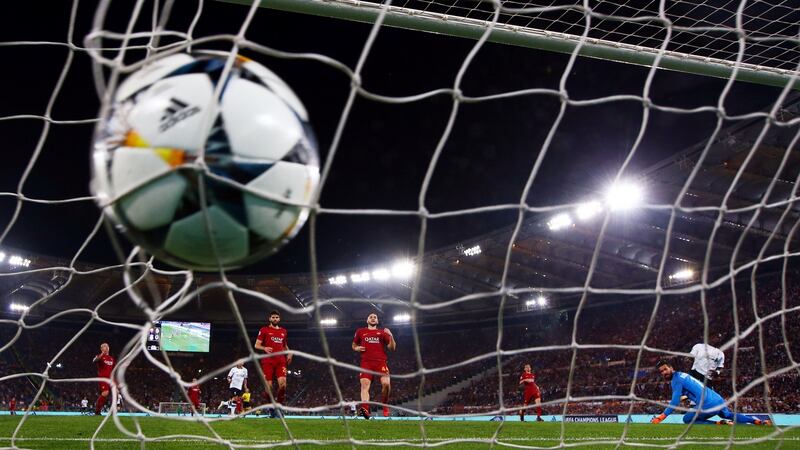 Liverpool’s Sadio Mane scores their first goal during the Champions League semi-final second leg against Roma at Stadio Olimpico in Rome. Photograph:  Tony Gentile/Reuters