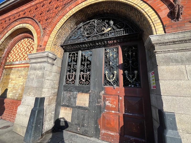 Fire damage to the doors of the market in Smithfield. Photograph: Olivia Kelly