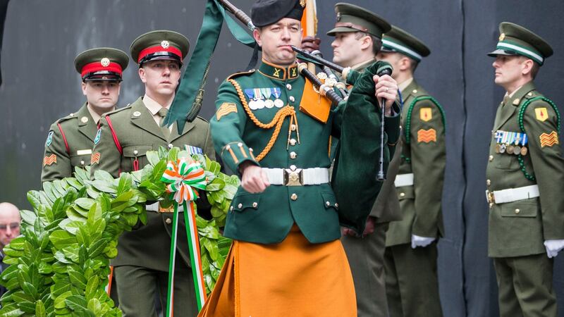 Wreaths are carried up amid Easter Rising commemorations marking the centenary  of the rebellion in Moore Street, Dublin, Easter Monday, 2016. Photograph: Irish Defence Forces/PA Wire