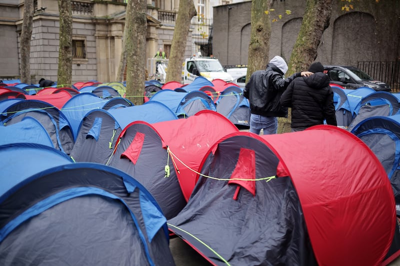 International asylum seekers sleeping in tents on January 5th next to Leinster House on Kildare Place. Photograph: Chris Maddaloni/The Irish Times