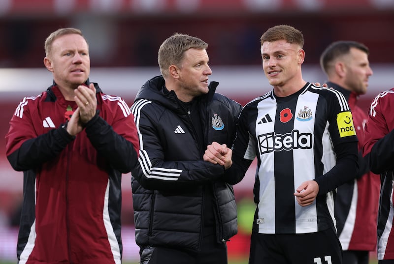 Eddie Howe, manager of Newcastle United, interacts with Harvey Barnes after the game. Photograph: Alex Livesey/Getty