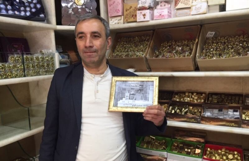 Mohammad Naulo in his sweet shop in Aleppo’s souk. Photograph: Michael Jansen