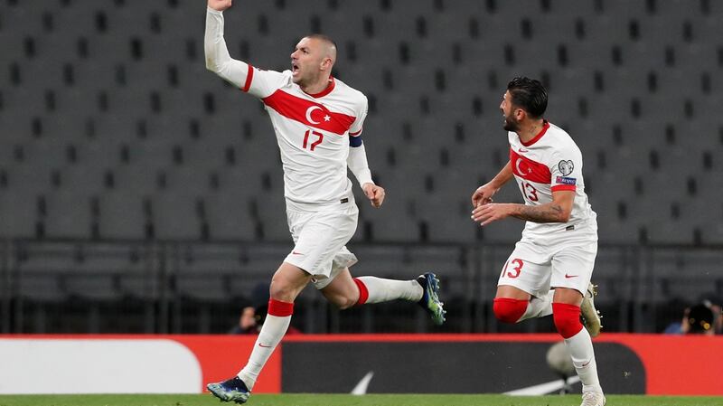 Burak Yilmaz  celebrates after completing his hat-trick and scoring Turkey’s fourth goal during the World Cup qualifier against the Netherlands  at the Ataturk Olympic Stadium in Istanbul. Photograph:  Murad Sezer/AFP via Getty Images