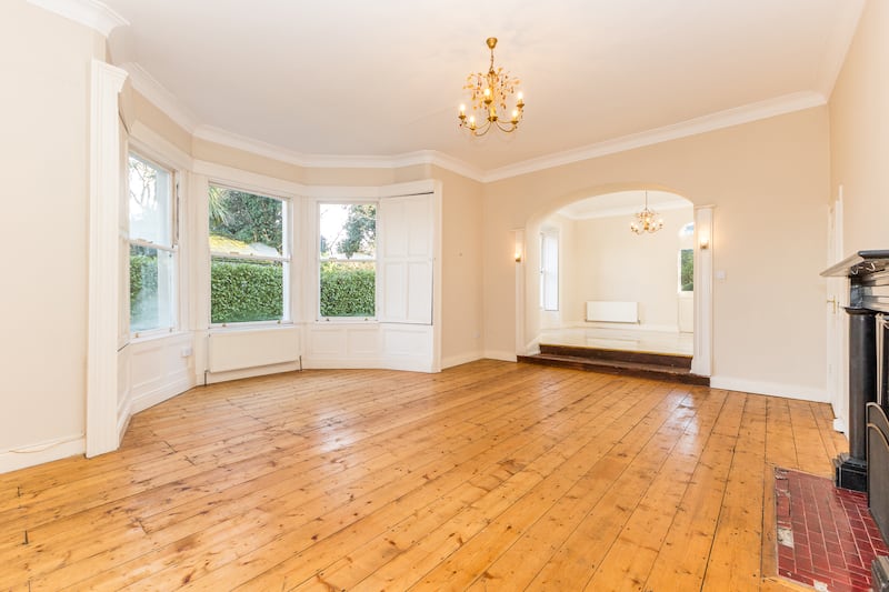 The drawingroom, located off the front hallway, has a large bay window