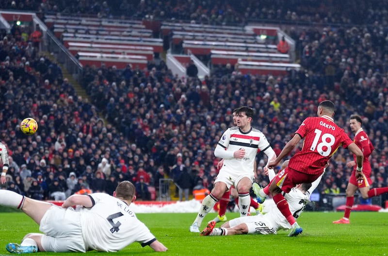 Cody Gakpo scores Liverpool's first goal. Photograph: Peter Byrne/PA