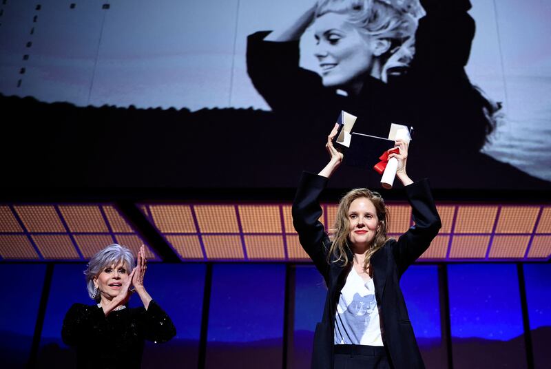 Palme d'Or: Jane Fonda applauds Justine Triet in Cannes. Photograph: Valery Hache/AFP via Getty