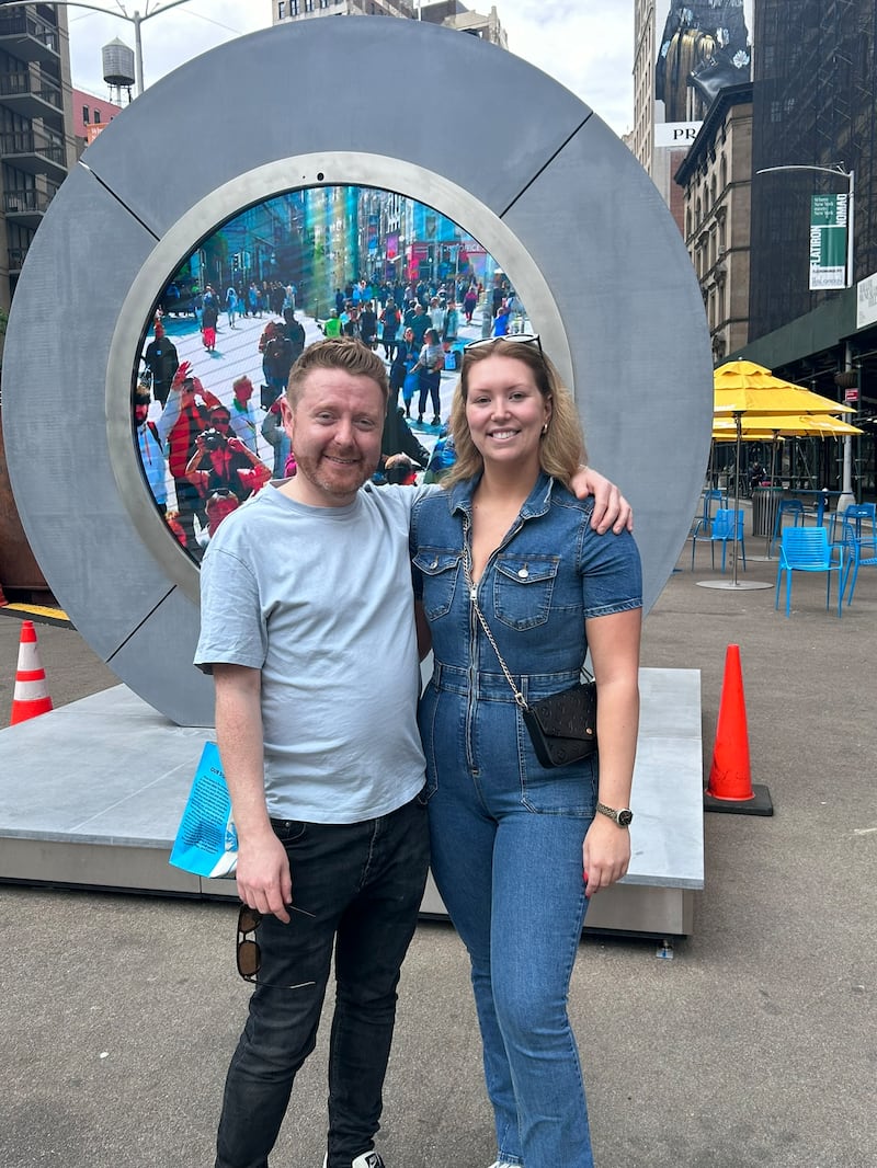 Aer Lingus flight attendants James and Kelly in Manhattan beside the Portal with Dublin. Photograph: Michael Fitzpatrick