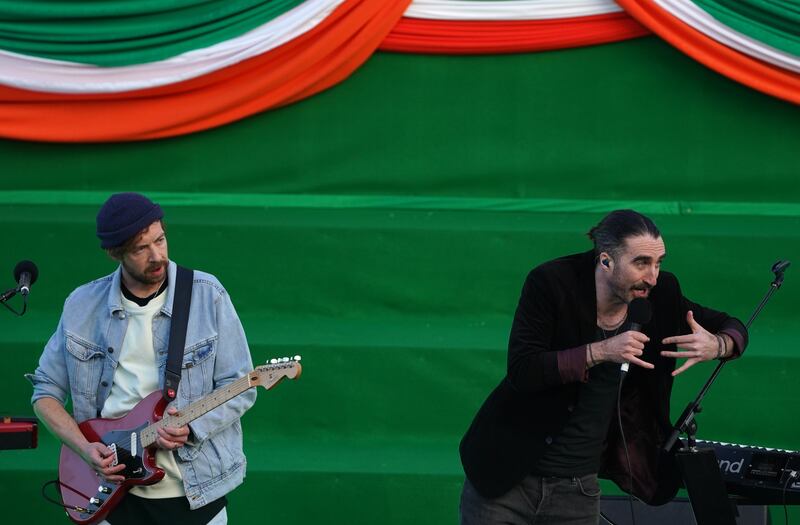 The Coronas performing on stage before US President Joe Biden delivers a speech at St Muredach's Cathedral on the last day of his visit to Ireland. 