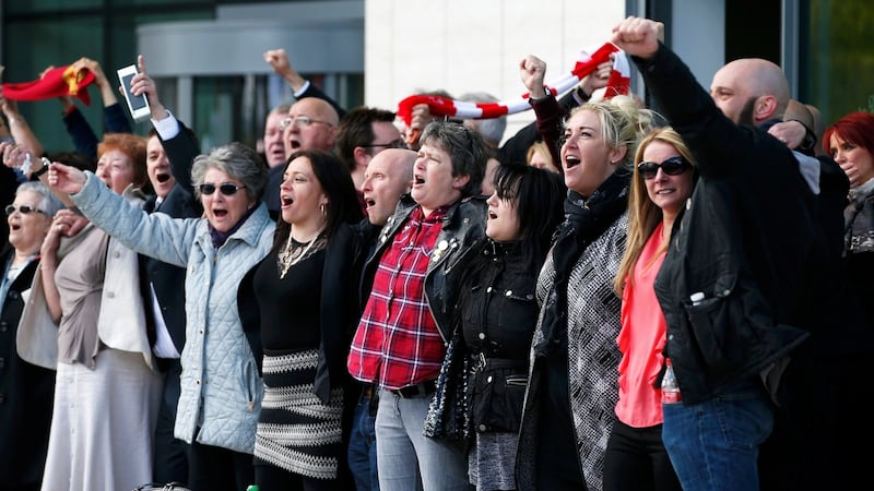 Relatives sing ‘You’ll never walk alone’ after the jury delivered its verdict at the new inquests into the Hillsborough disaster, in Warrington. Photograph: Andrew Yates/Reuters