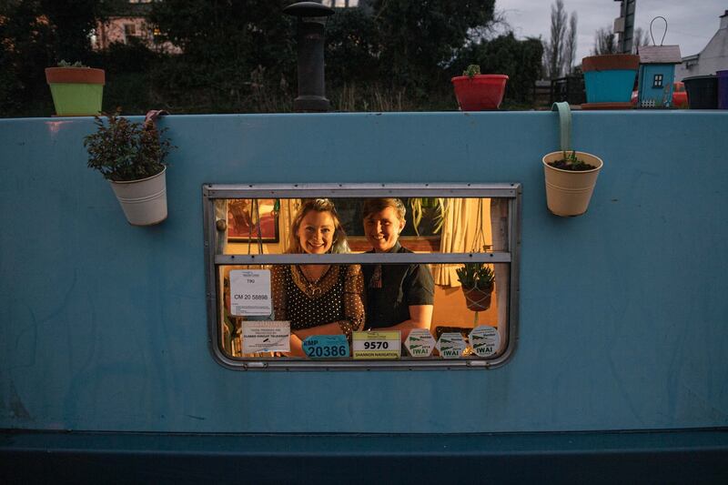 Claire and Ais on their houseboat. Photograph: Ruth Medjber.