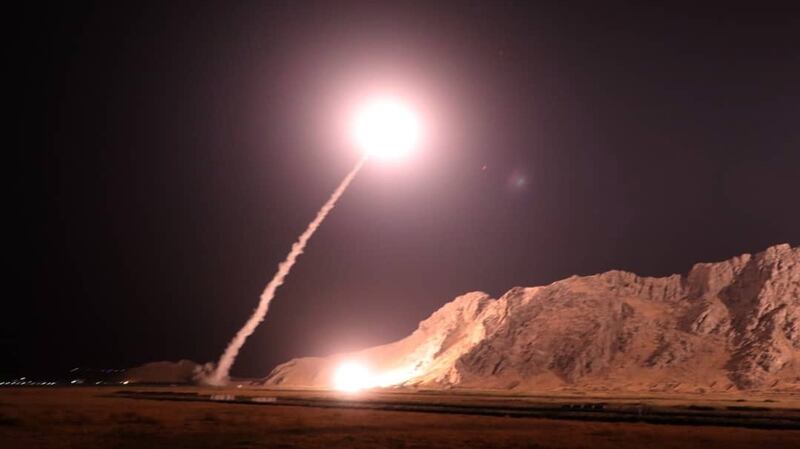 A handout photo from  Iran’s Revolutionary Guard showing missiles being launches from an undisclosed location targeting an  Islamic State group  in eastern Syria.  Photograph: Handout photo provided by Iran’s Revolutionary Guard website via Sepah News