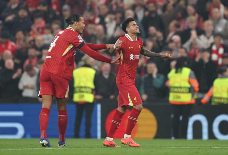 Luis Diaz of Liverpool celebrates with team-mate Virgil van Dijk. Photograph: Carl Recine/Getty