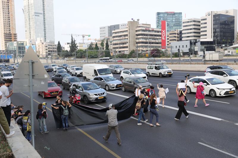 Families of Israeli hostages held by Hamas in Gaza and their supporters block the Ayalon Highway during a protest calling on the Israeli war cabinet to make a deal for the release of the hostages, in Tel Aviv last week. Photograph: Abir Sultan/EPA