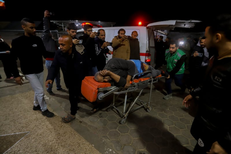 Injured Palestinians are taken to hospital after an Israeli attack in Deir Al Balah, Gaza. Photograph by Saeed Jaras/AFP