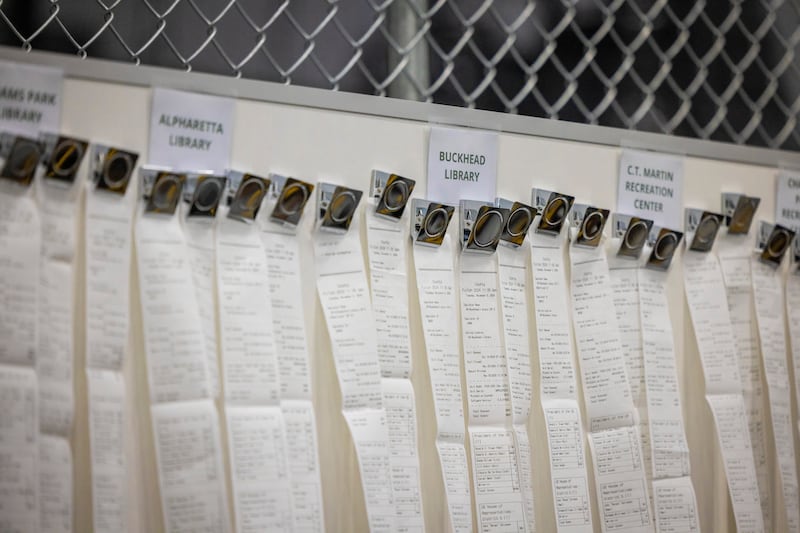 Voting results are displayed on receipts at the Fulton County Election Hub in Union City, Georgia. Photograph: Audra Melton/The New York Times