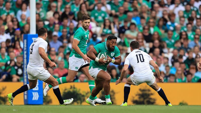 Ireland's Bundee Aki runs at George Ford of England during the game at the Aviva Stadium. Photograph: Evan Treacy/Inpho