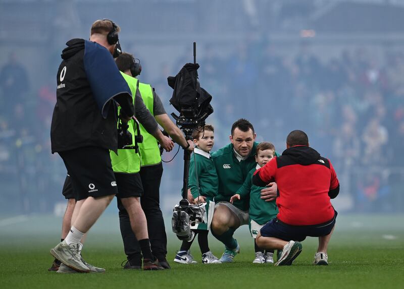 Cian Healy poses for a photograph with his children. Photograph: Charles McQuillan/Getty