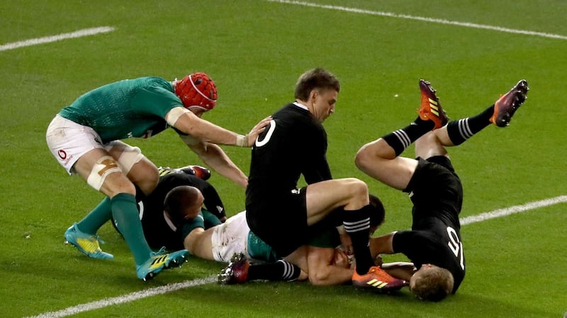 Jacob Stockdale scores his  try in 2018.