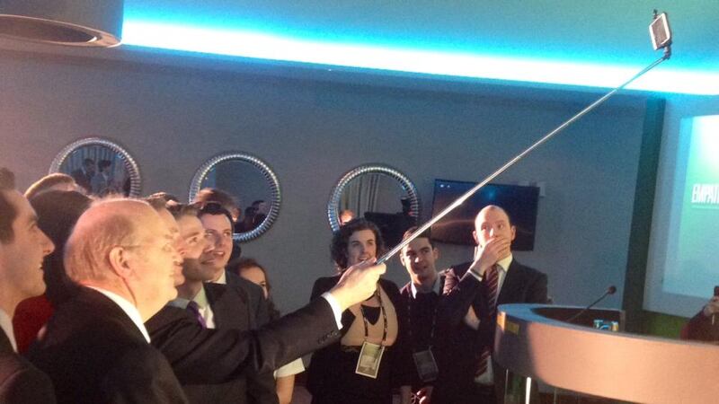 Taoiseach Enda Kenny and Minister for Finance Michael Noonan pose for photographs with members of Young Fine Gael at the organisation’s national conference in Limerick. Photograph: Kathryn Hayes