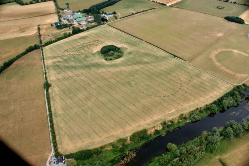 Two large prehistoric henges depicted  as cropmarks last July. Their location and relation between each other and other monuments on the floodplain indicates a deliberate ritual focus across the landscape in the shadow of Newgrange passage tomb. A third previously unknown henge has been identified between the two clearly visible ones, further adding to the significance of the landscape.