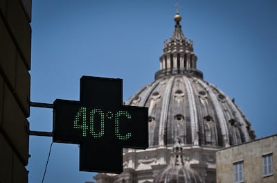 A pharmacy's sign in Rome, with Saint Peter's Basilica in the background, shows an outside temperature of 40 degrees during the heatwave that afflicted Italy this month. Photograph: Tiziana Fabi//AFP via Getty Images