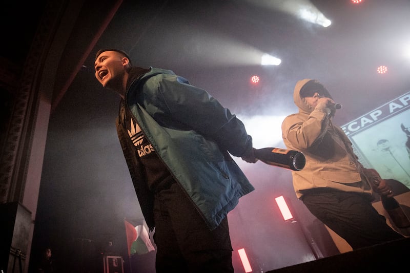 Móglaí Bap and Mo Chara of Kneecap performing at the 3Olympia Theatre. Photograph: Tom Honan