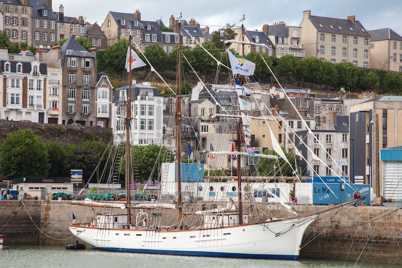 Sailing boat in Granville harbour in Normandy France. Photograph: Getty