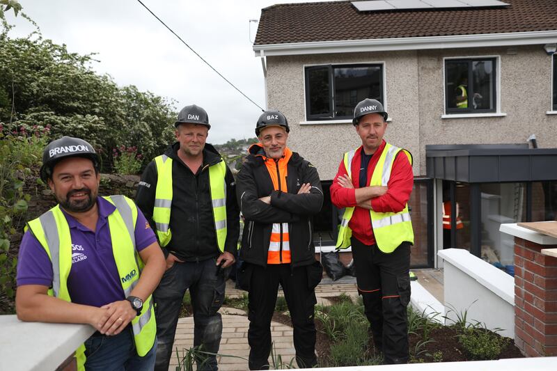 DIY SOS Drummond: builders with show presenter Baz Ashmawy.