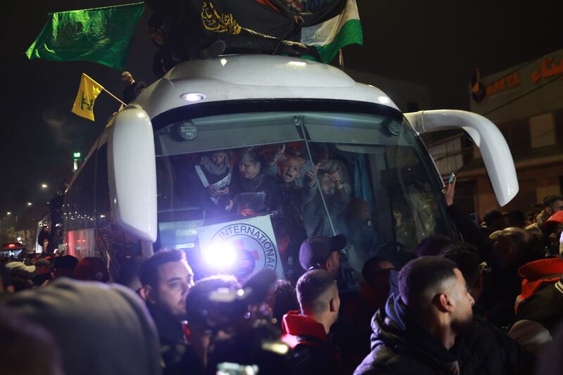 Gaza ceasefire: A bus carrying released Palestinian prisoners from the Ofer Israeli military prison arrives in Ramallah early today. Photograph: EPA