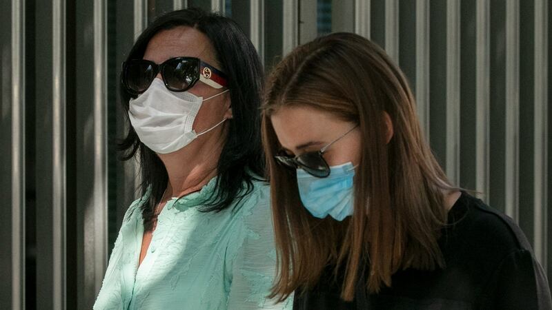 Nadine Lott’s mother Claire Lott (left) and sister Tanith Lott  leaving the Central Criminal Court on Tuesday. Photograph: Collins Courts