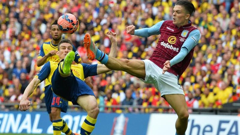 Aston Villa’s Jack Grealish challenges for the ball with Arsenal’s  Laurent Koscielny during the FA Cup final against Arsenal at Wembley. Photo:  Glyn Kirk. AFP Photo/Getty Images