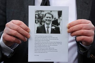 A mourner holds a order of service after the funeral of Brian Hutton. Photograph: Liam McBurney/PA