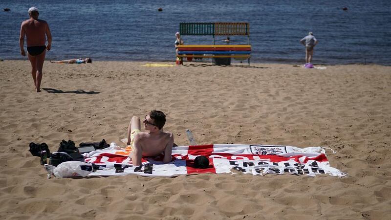 England fans relax on the banks of the Volga ahead of the clash with Sweden. Photo: Getty Images