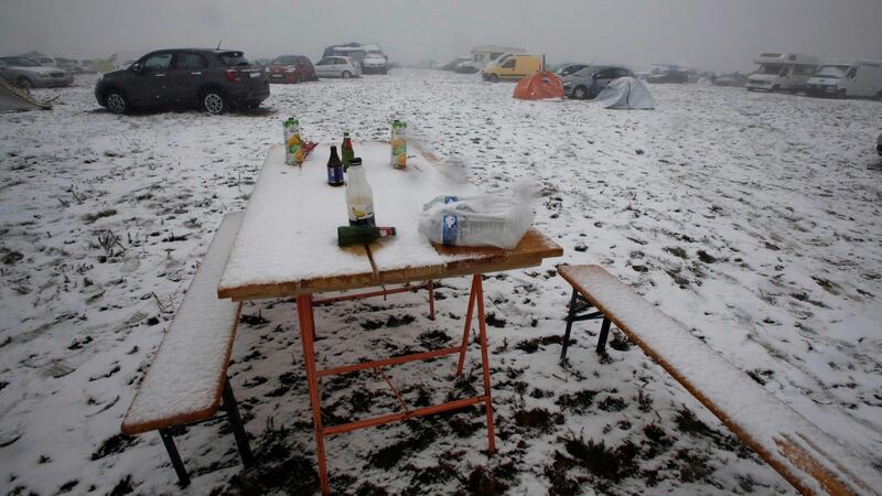 A table covered with snow during the Teknival techno music festival. Photograph: PASCAL LACHENAUD/AFP/Getty Images