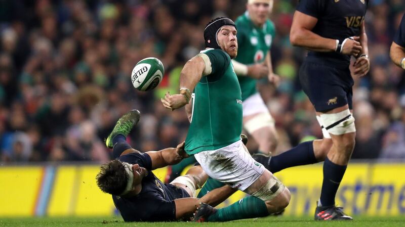 Ireland’s Sean O’Brien attempts an offload. Photograph: James Crombie/Inpho