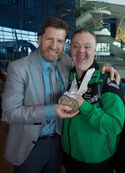 Cyril Walker from Markethill, Co Armagh, with Special Olympics Ireland CEO Mat English after Team Ireland athletes and supporters returned from the 2017 Special Olympics World Winter Games in Austria. Photograph: Ray McManus/Sportsfile