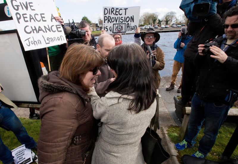 An unidentified woman, who claimed to be from Rooskey, confronts one of the organizers, Leah Doherty Photograph: Brian Farrell/Irish Times