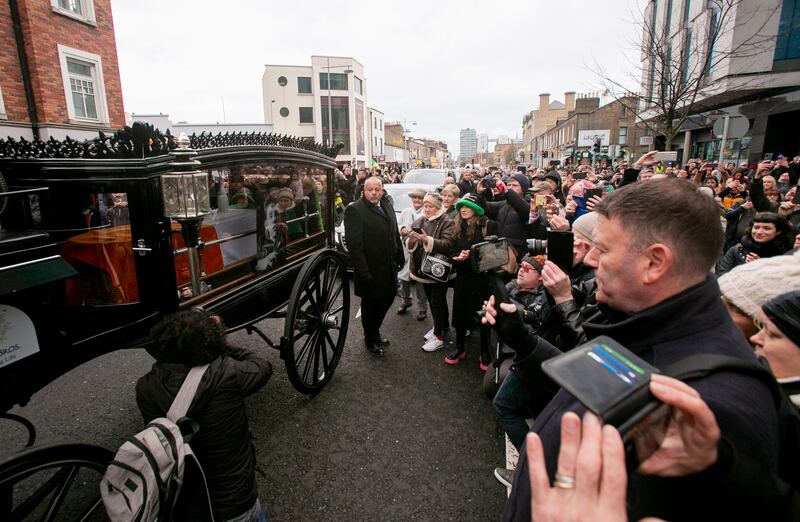 The remains of Shane MacGowan pass MacMahon Bridge. Photograph: Collins
