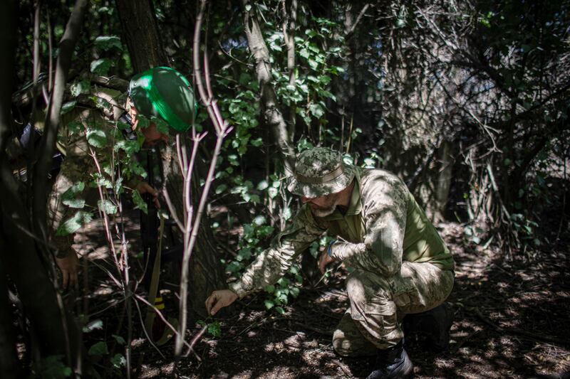 Ukrainian marines training to spot and disarm mines in southeast Ukraine. Photograph: (Diego Ibarra Sanchez/The New York Times)