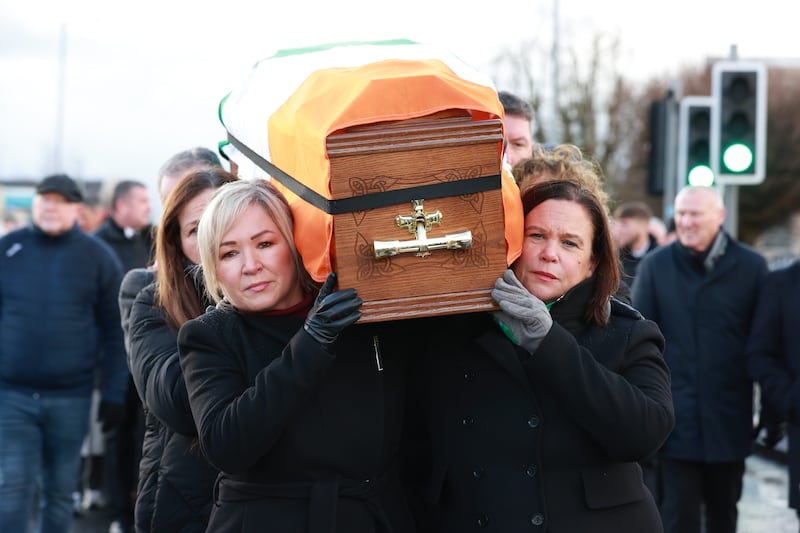 Sinn Féin vice-president Michelle O'Neill and party president Mary Lou McDonald assist in carrying Howell's coffin to the cemetery in Belfast. Photograph: Liam McBurney/PA Wire