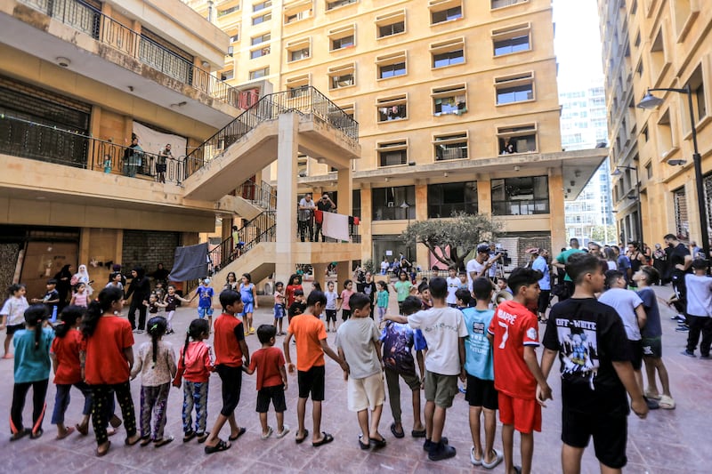 Children displaced by conflict from south Lebanon play in the courtyard of the Azariyeh building complex where they are sheltering in central Beirut on October 15th. Photograph: AFP via Getty Images