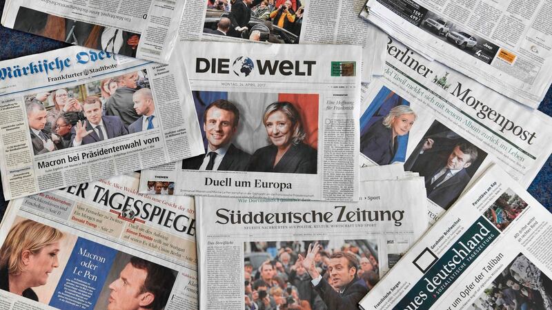 The front pages of German national newspapers report on results of the first round of France’s presidential election. Photograph: John MacDougall/AFP/Getty Images