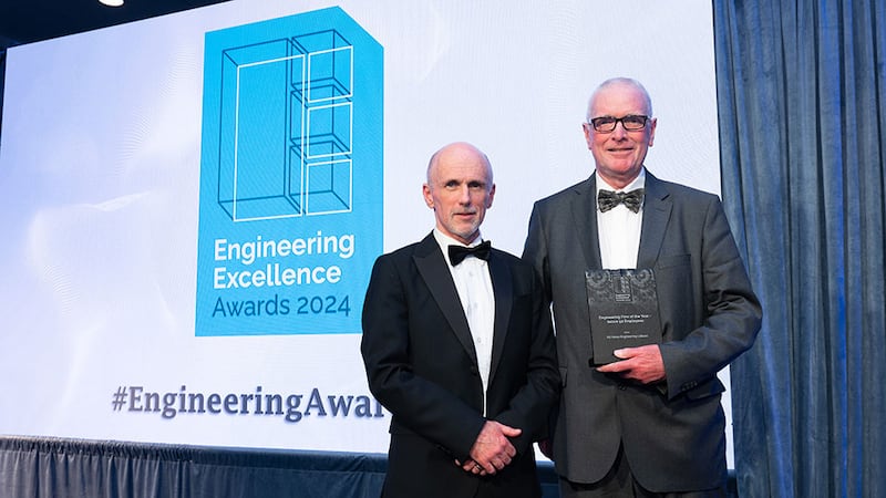 Michael Connelly, awards judge, presents the engineering firm of the year(below 50 employees) award to Roger Vance, Ad-Vance Engineering Lisburn